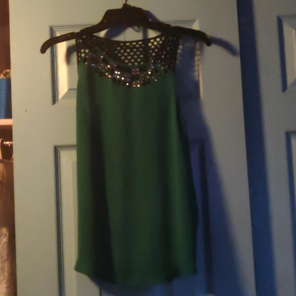 Express top, missing a rhinstone